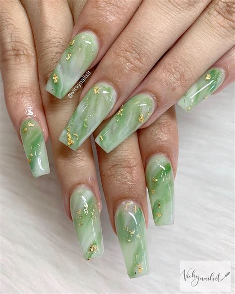 jade green acrylic nail designs.